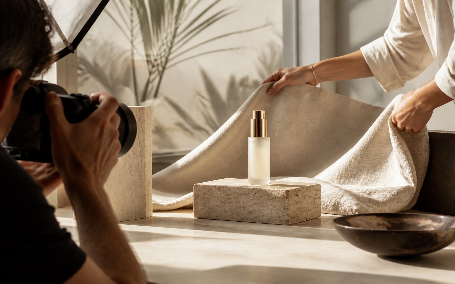 A photographer and stylist producing a refined campaign in a daylight studio